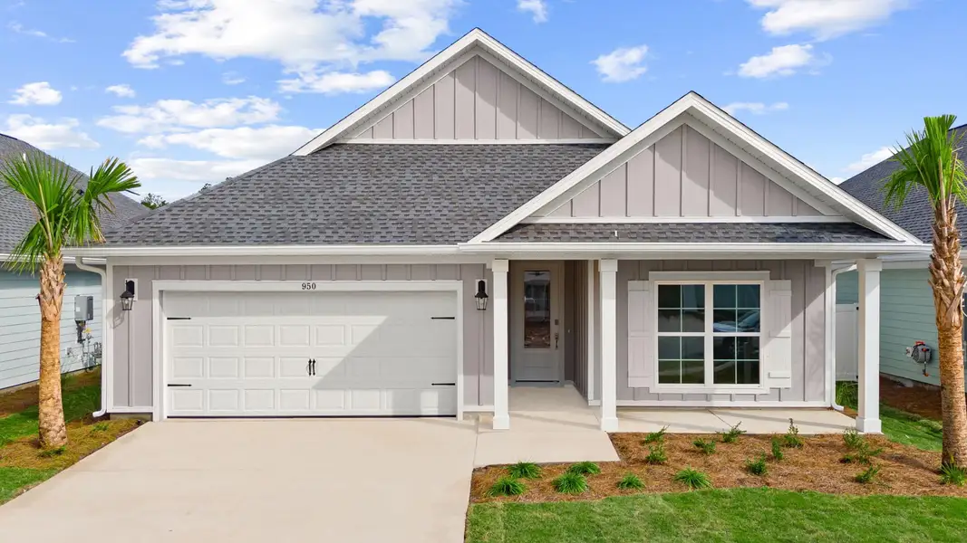Front exterior of a new home in Breakfast Point East Phase II, Panama City Beach, FL, highlighting curb appeal (Image 1).