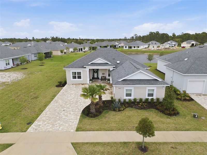 Front exterior of a new home in , Deland, FL, highlighting curb appeal (Image 22).