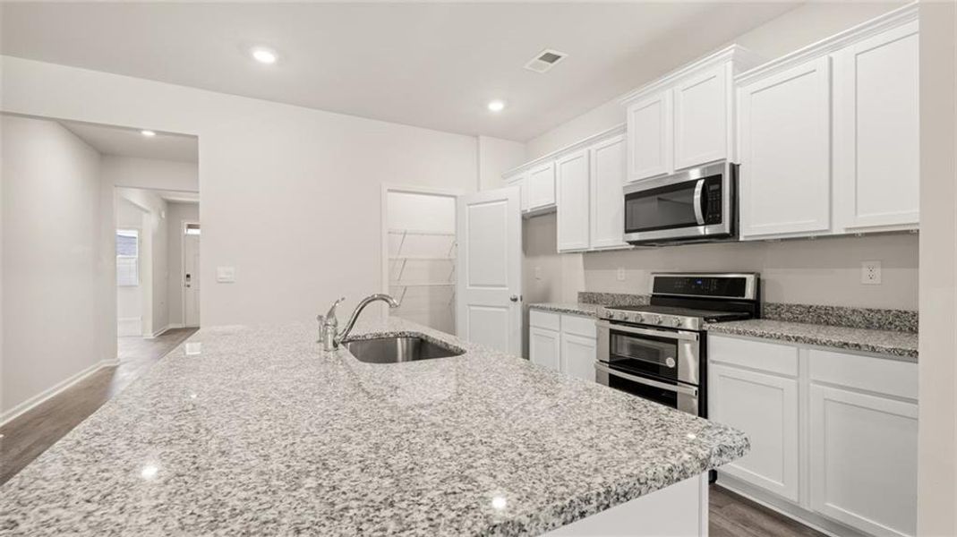 Furnished interior view inside a new home in The Preserve at Agricultural Village, Perry (Image 9).