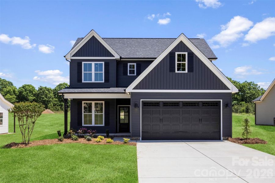 Front exterior of a new home in , Albemarle, NC, highlighting curb appeal (Image 22).