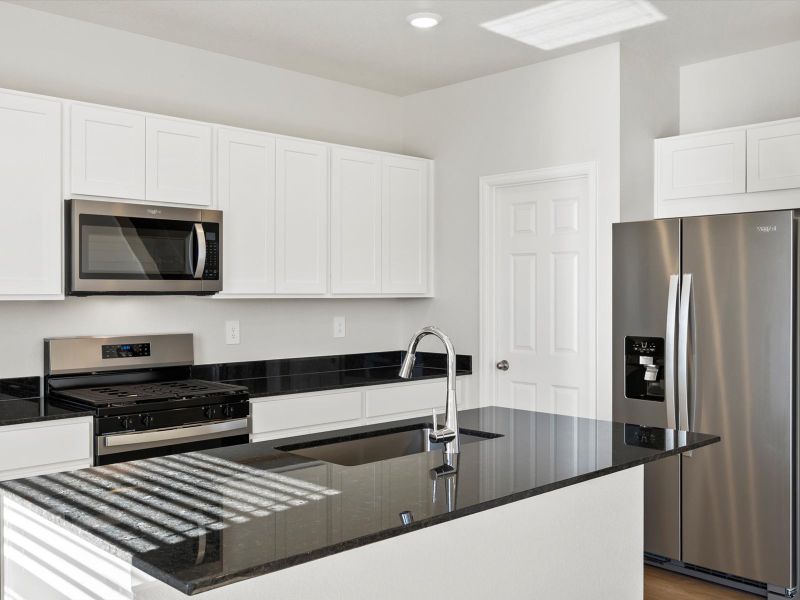Furnished interior view inside a new home in Lorson Ranch : The Springs Collection, Colorado Springs (Image 3).