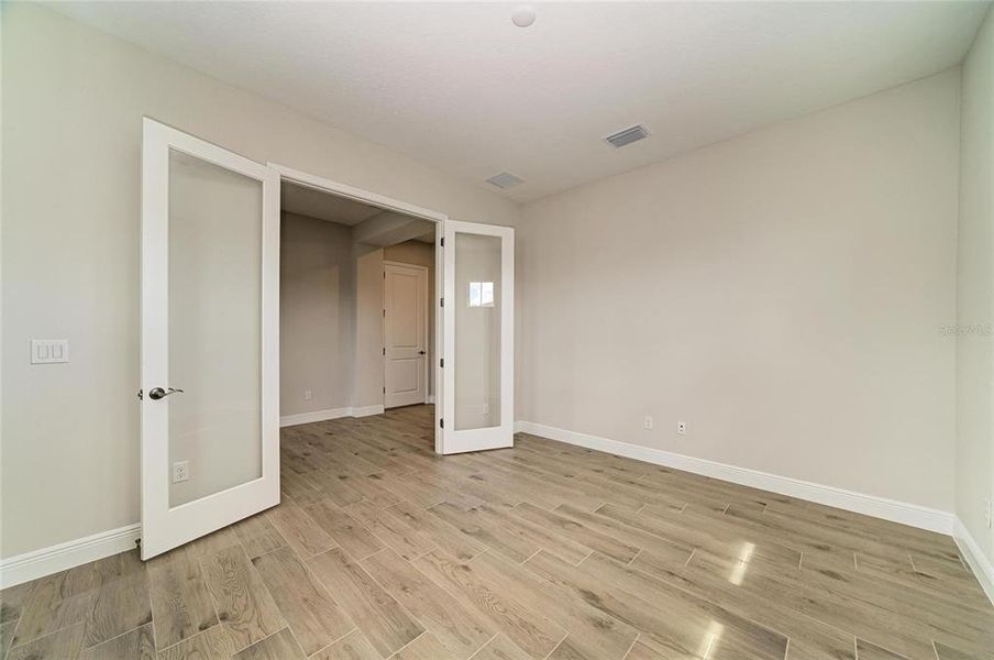 Spacious, unfurnished interior of a new home in North River Ranch, Parrish (Image 40).