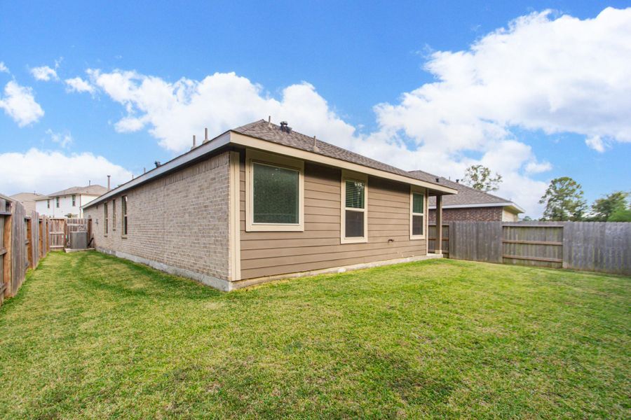 Exterior details and patio area of a home in Newport Preserve, Crosby (Image 19).