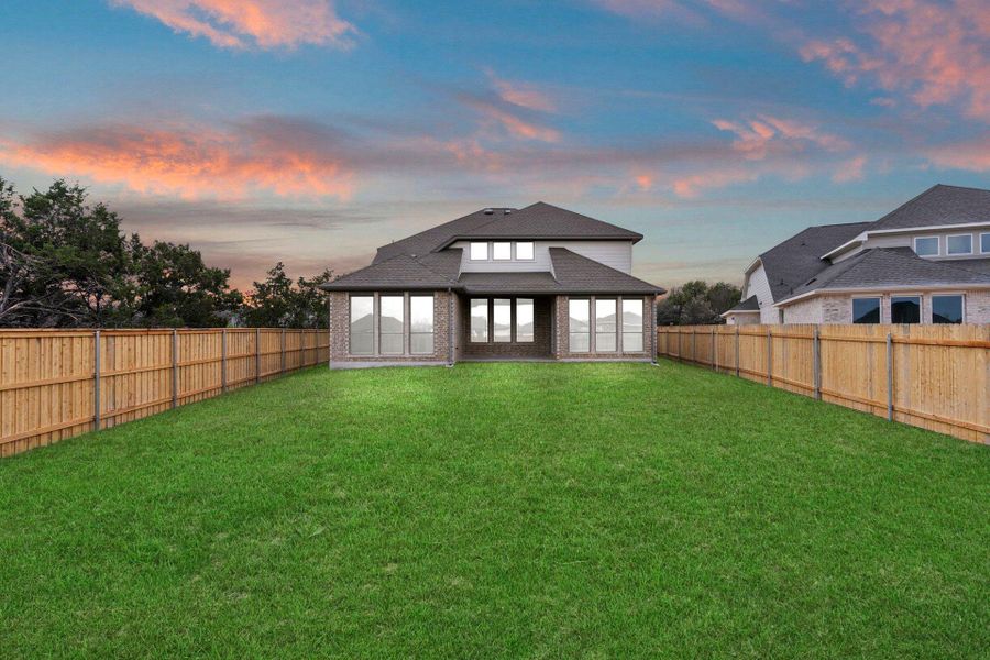 Rear of Home and Private Backyard