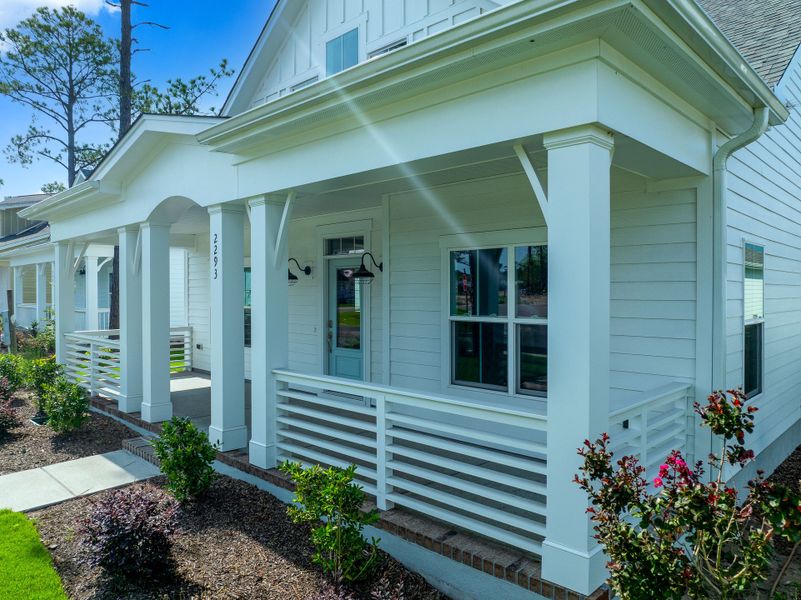 Front exterior of a new home in Osprey Landing, Southport, NC, highlighting curb appeal (Image 27).