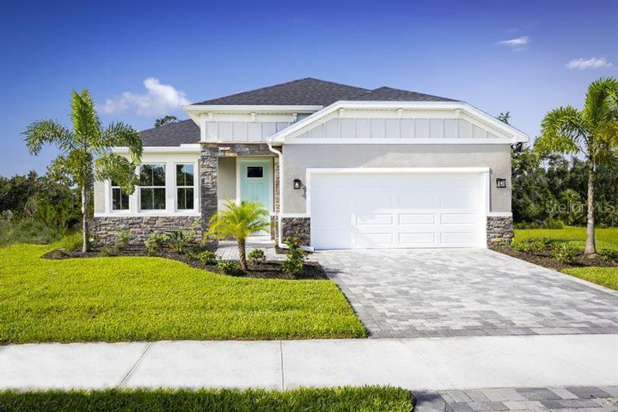 Front exterior of a new home in , Venice, FL, highlighting curb appeal (Image 1). Front exterior of a new home in , Venice, FL, highlighting curb appeal (Image 1).