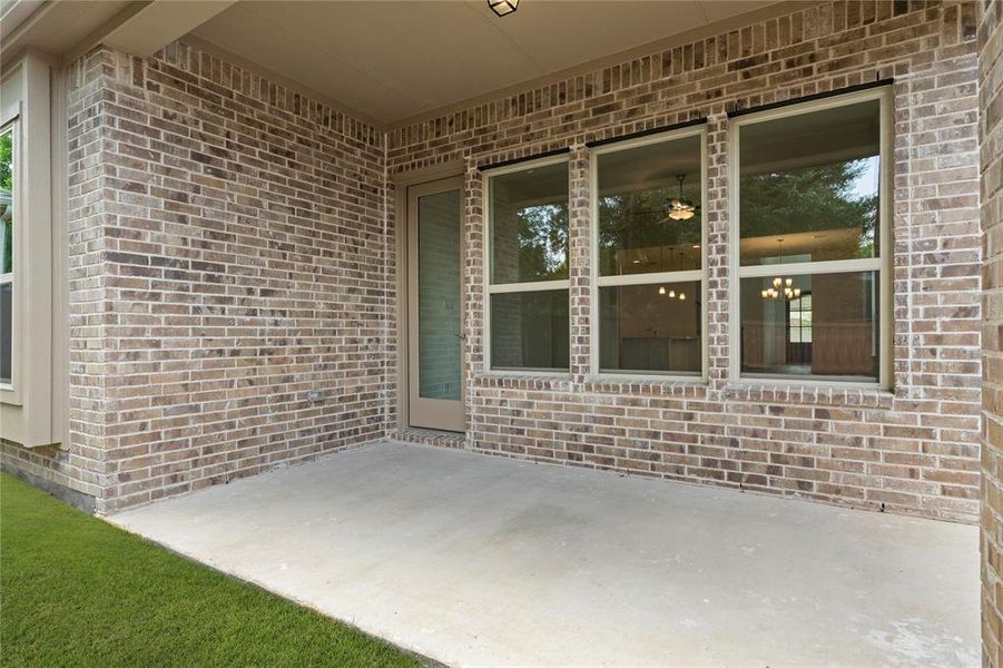 Exterior details and patio area of a home in Villas at Long Branch, Rowlett (Image 4). Exterior details and patio area of a home in Villas at Long Branch, Rowlett (Image 4).