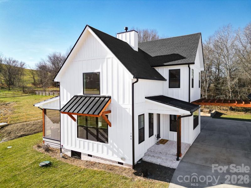 Exterior details and patio area of a home in , Mills River (Image 3).