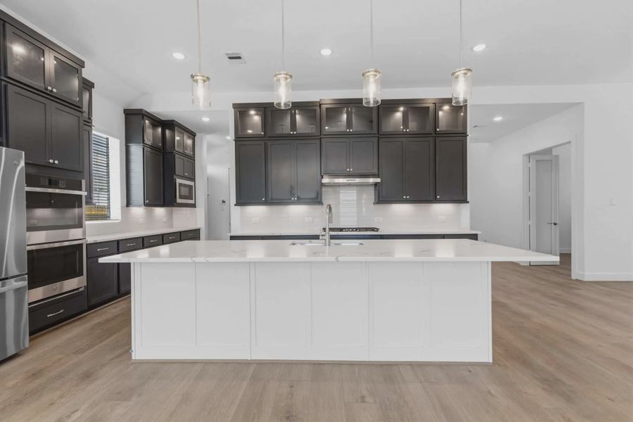Representative furnished interior of a home built from the Cayman by Chesmar Homes in Blue Heron, Mont Belvieu (Image 9). Representative furnished interior of a home built from the Cayman by Chesmar Homes in Blue Heron, Mont Belvieu (Image 9).