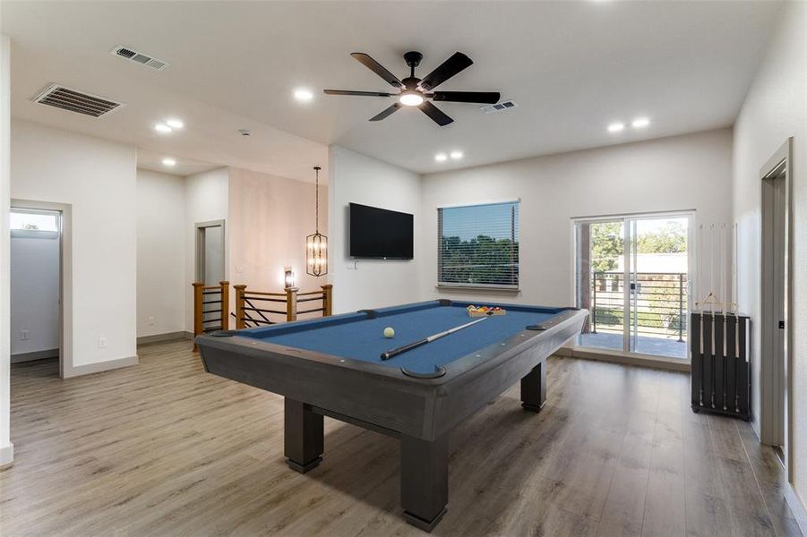 Recreation room featuring billiards table, light wood-style flooring, recessed lighting, and a ceiling fan Recreation room featuring billiards table, light wood-style flooring, recessed lighting, and a ceiling fan