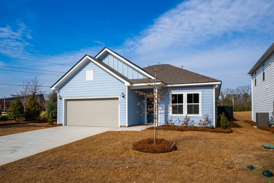 Front exterior of a new home in Monroe Preserve, Chapin, SC, highlighting curb appeal (Image 28).