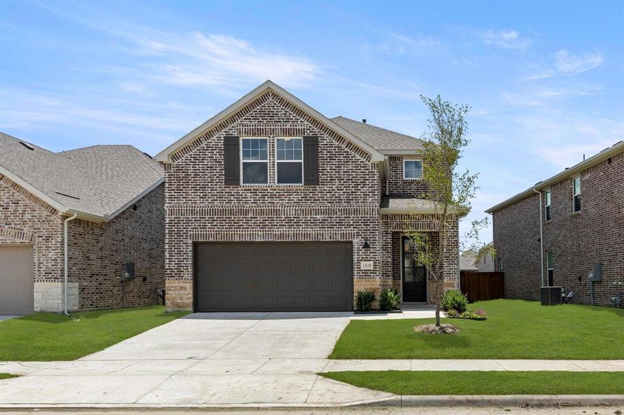 Front exterior of a new home in Creekview Fossil Ridge, Pilot Point, TX, highlighting curb appeal (Image 20). Front exterior of a new home in Creekview Fossil Ridge, Pilot Point, TX, highlighting curb appeal (Image 20).