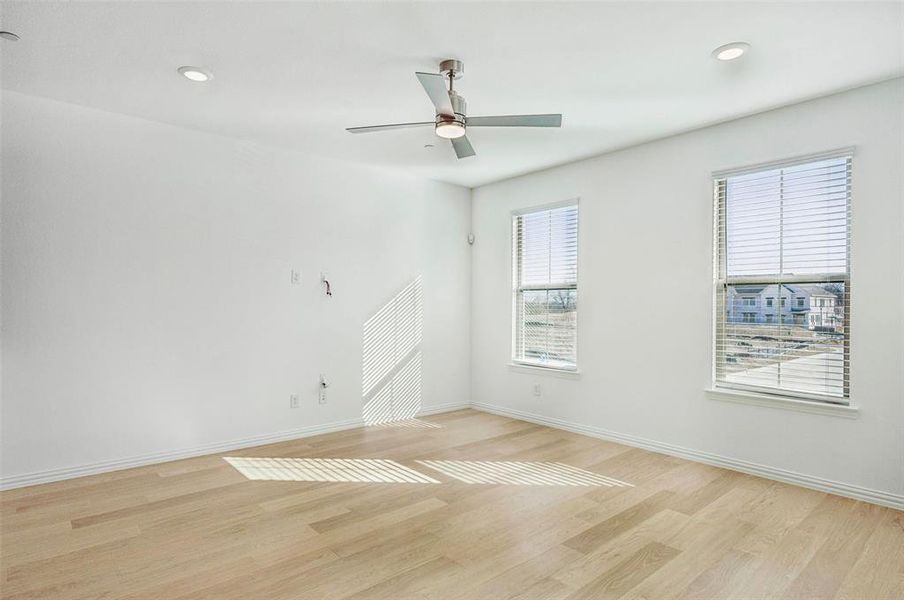 With multiple walls of windows, you'll enjoy a family room flooded with natural light.