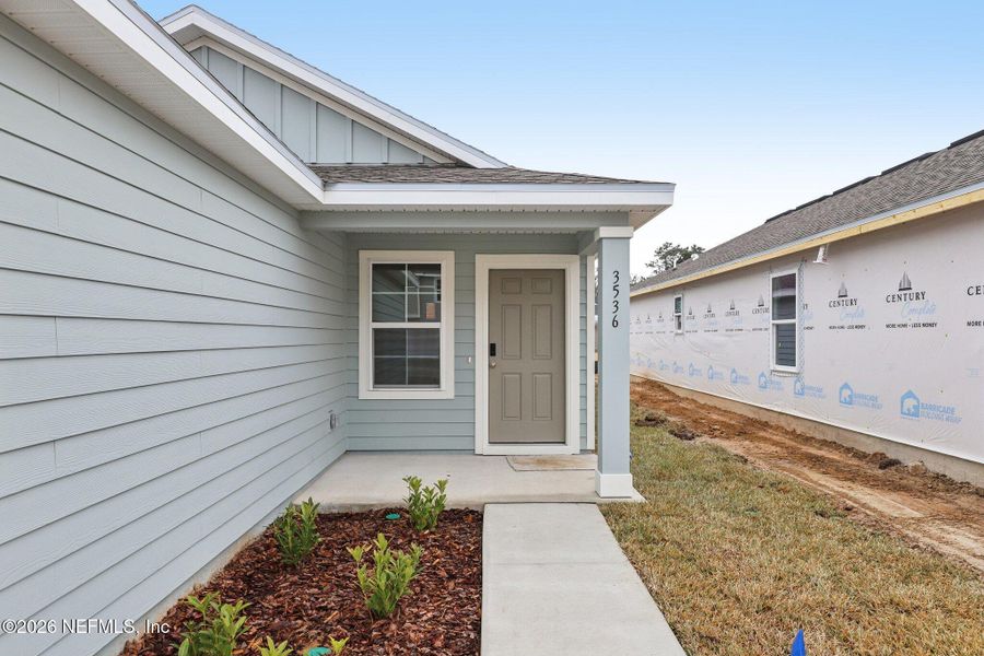 Exterior details and patio area of a home in Kings Landing, Jacksonville (Image 3).