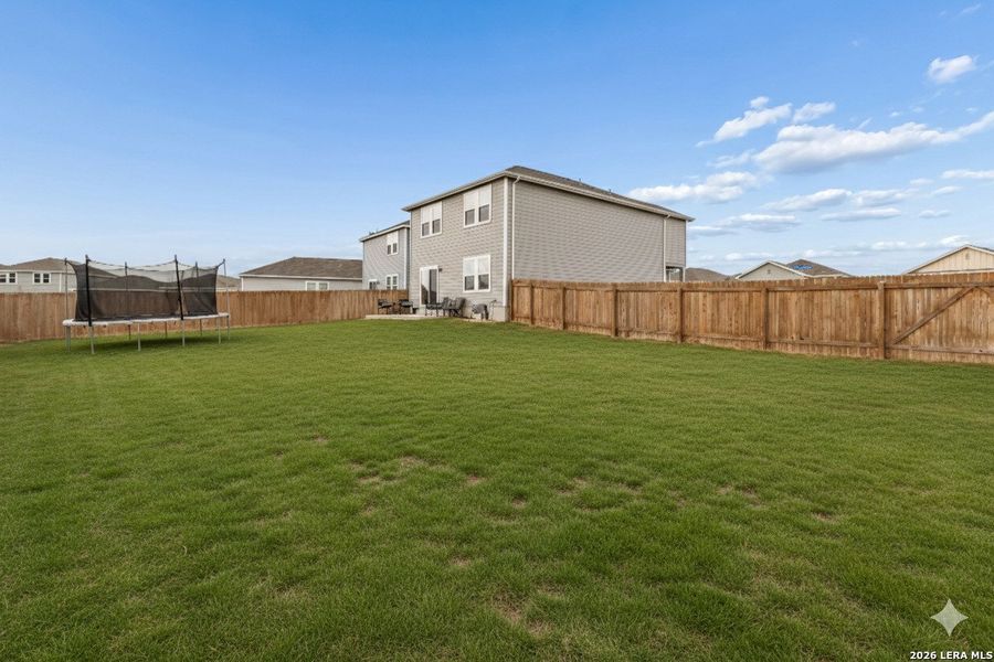 Exterior details and patio area of a home in Liberte, Converse (Image 26). Exterior details and patio area of a home in Liberte, Converse (Image 26).