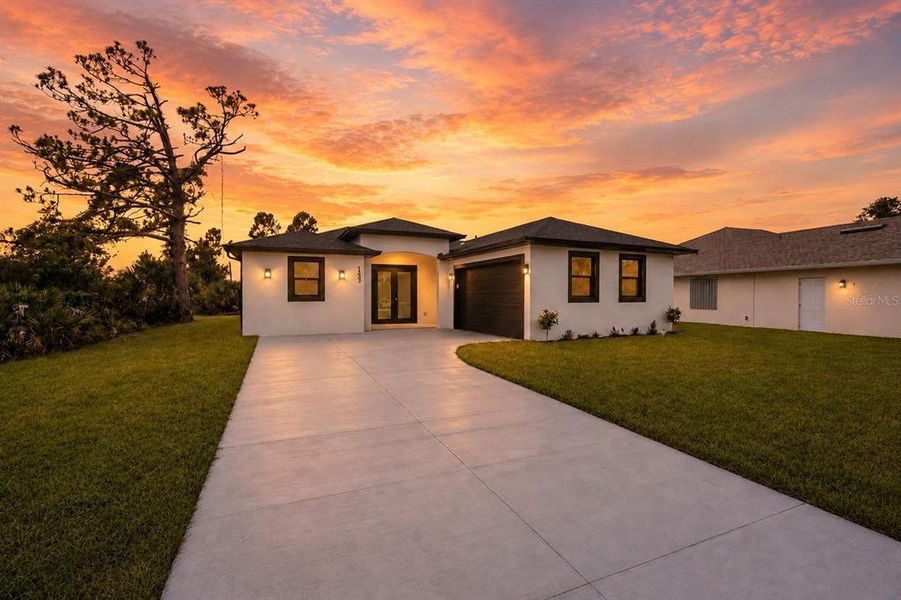 Front exterior of a new home in , Rotonda West, FL, highlighting curb appeal (Image 18).