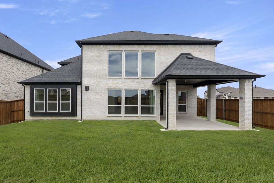 Exterior details and patio area of a home in Nelson Lake Estates, Rockwall (Image 22).