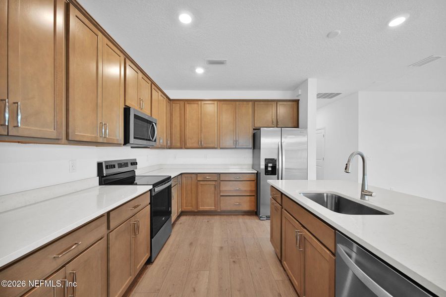 Furnished interior view inside a new home in Hyland Trail, Green Cove Springs (Image 6).