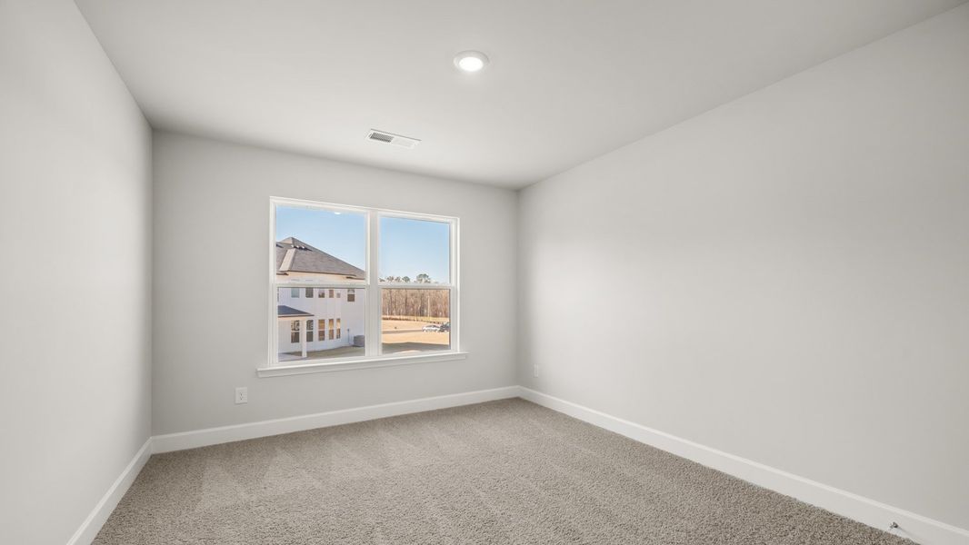 Representative unfurnished interior of a home built from the Packard by D.R. Horton in Evergreen Crossing, Locust Grove (Image 29).