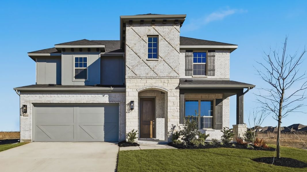 Front exterior of a new home in Green Meadows Premier, Celina, TX, highlighting curb appeal (Image 1). Front exterior of a new home in Green Meadows Premier, Celina, TX, highlighting curb appeal (Image 1).
