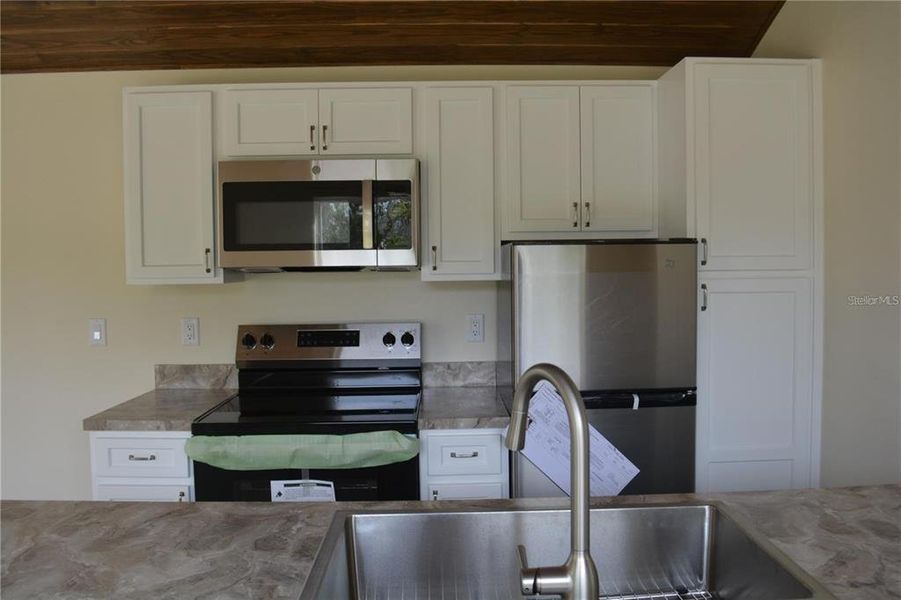 Furnished interior view inside a new home in , Oviedo (Image 5).