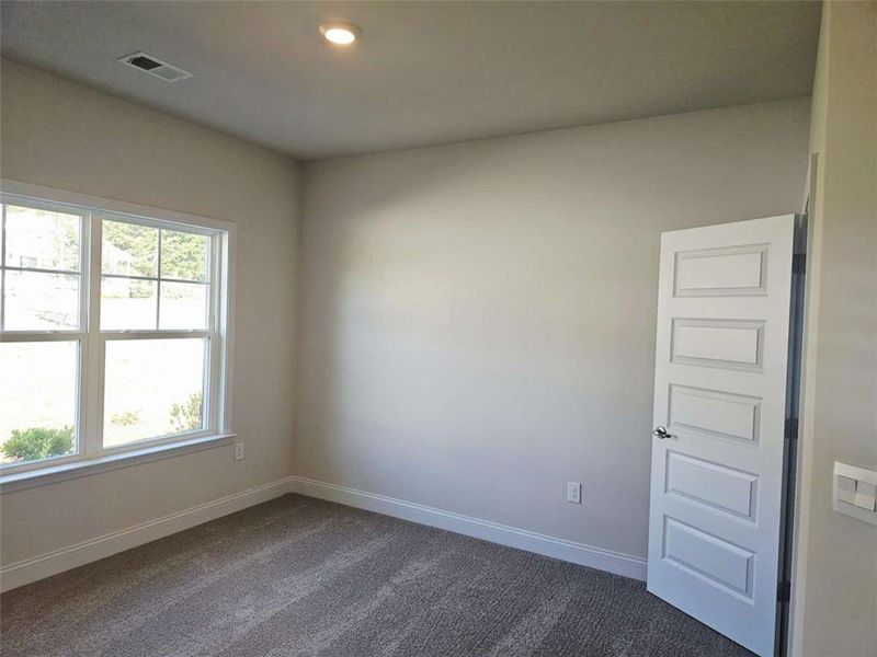 Spacious, unfurnished interior of a new home in Scarlett Place, Bowdon (Image 12).