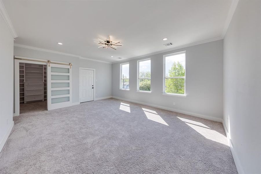 Master bedroom with plenty of beautiful natural light.