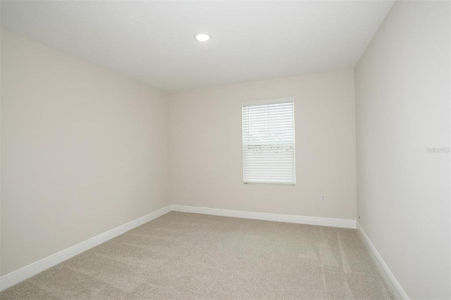 Spacious, unfurnished interior of a new home in Pasadena Woods, Dade City (Image 24).