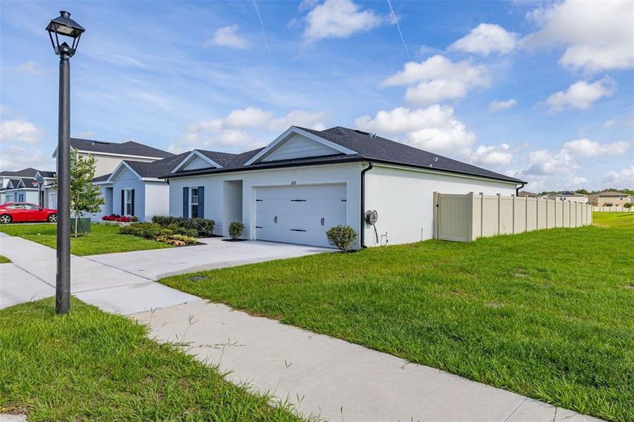 Front exterior of a new home in , Sumterville, FL, highlighting curb appeal (Image 25).
