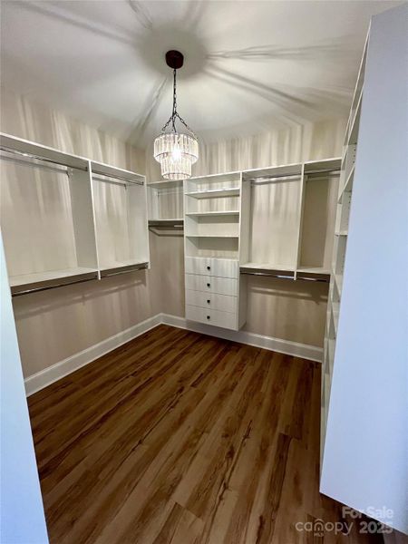 Primary Bedroom - Walk-in Closet Connected to Laundry Room