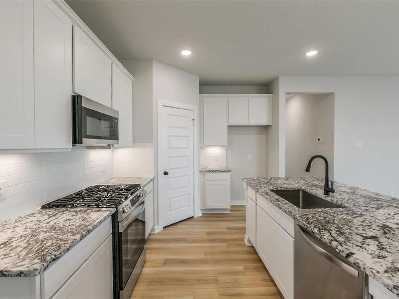 Furnished interior view inside a new home in Emberly, Beasley (Image 12).