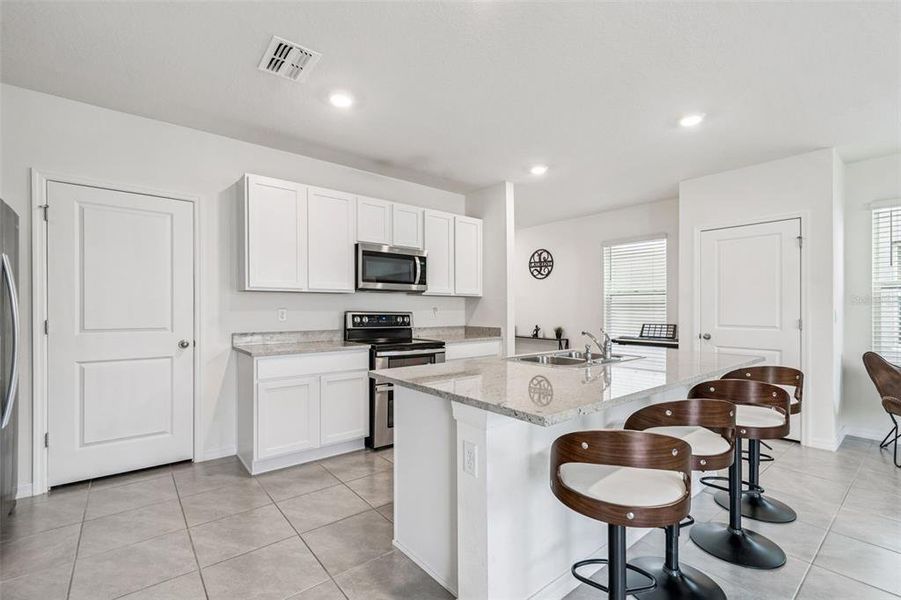 Furnished interior view inside a new home in Westgate at Avalon Park, Wesley Chapel (Image 66).