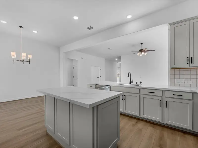 Kitchen. Sample product photo. Actual exterior and interior selections may vary by homesite. Photo may be virtually staged. Kitchen. Sample product photo. Actual exterior and interior selections may vary by homesite. Photo may be virtually staged.