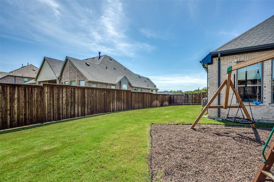 Front exterior of a new home in , Mansfield, TX, highlighting curb appeal (Image 20).