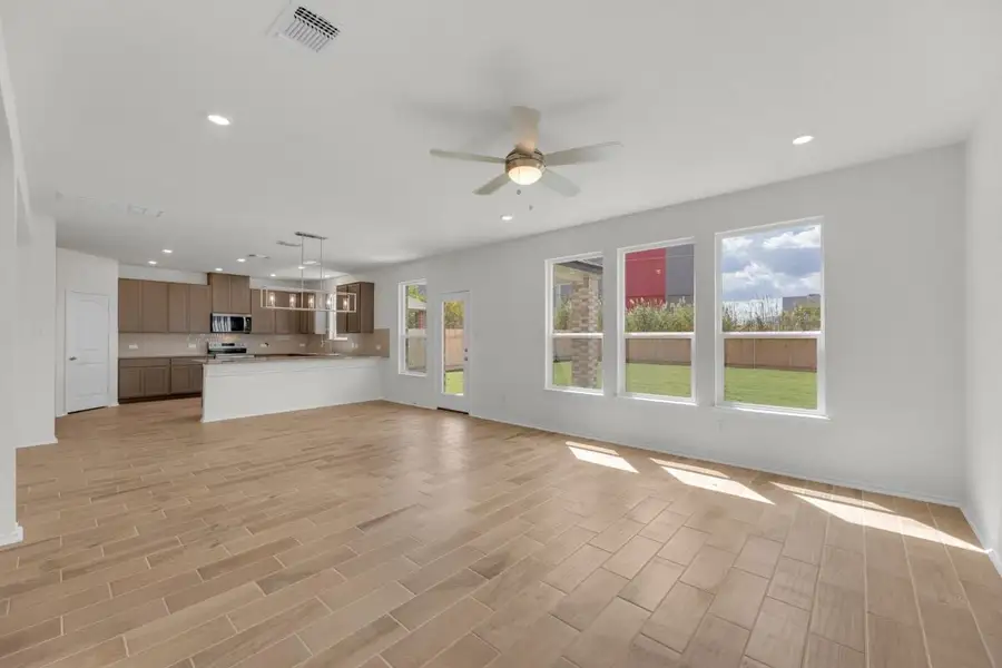 Spacious, unfurnished interior of a new home in Mustang Valley, Manor (Image 19).