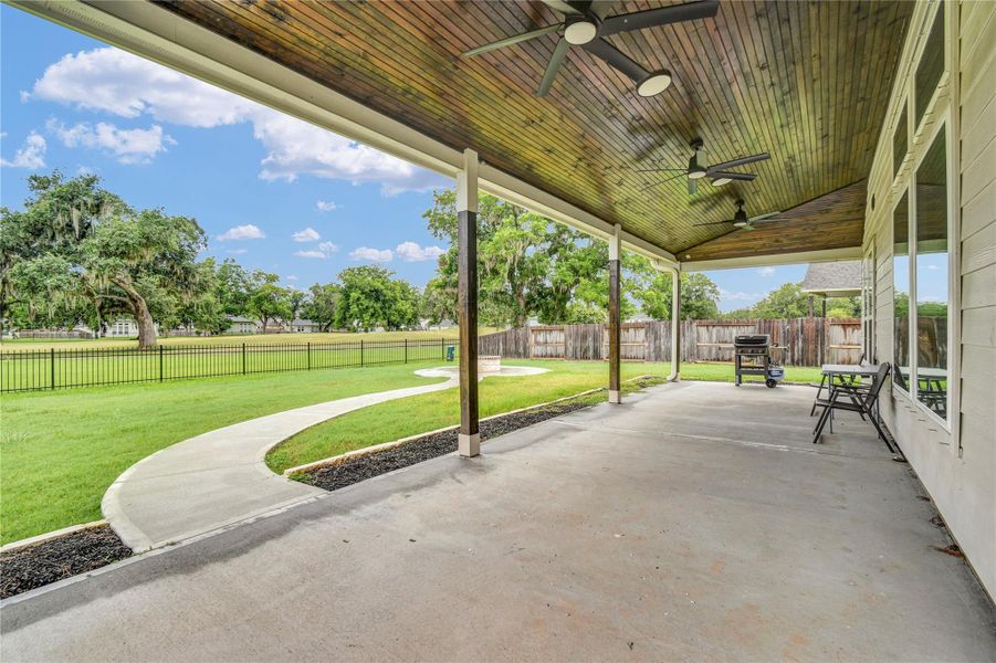 Welcome to your wrap around extended patio with ceiling fans and gorgeous wood planks Welcome to your wrap around extended patio with ceiling fans and gorgeous wood planks