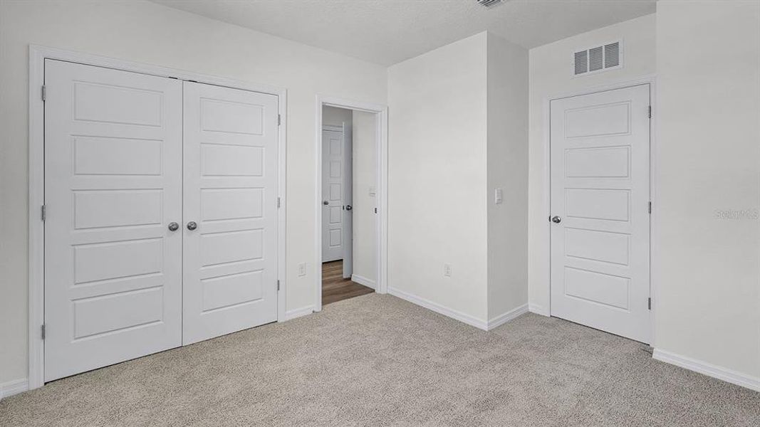 Spacious, unfurnished interior of a new home in Harmony at Lake Eloise, Winter Haven (Image 17).