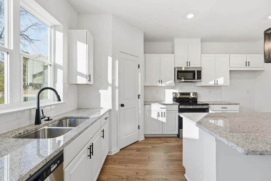 Furnished interior view inside a new home in Somerset at Veterans Memorial, Mableton (Image 10). Furnished interior view inside a new home in Somerset at Veterans Memorial, Mableton (Image 10).
