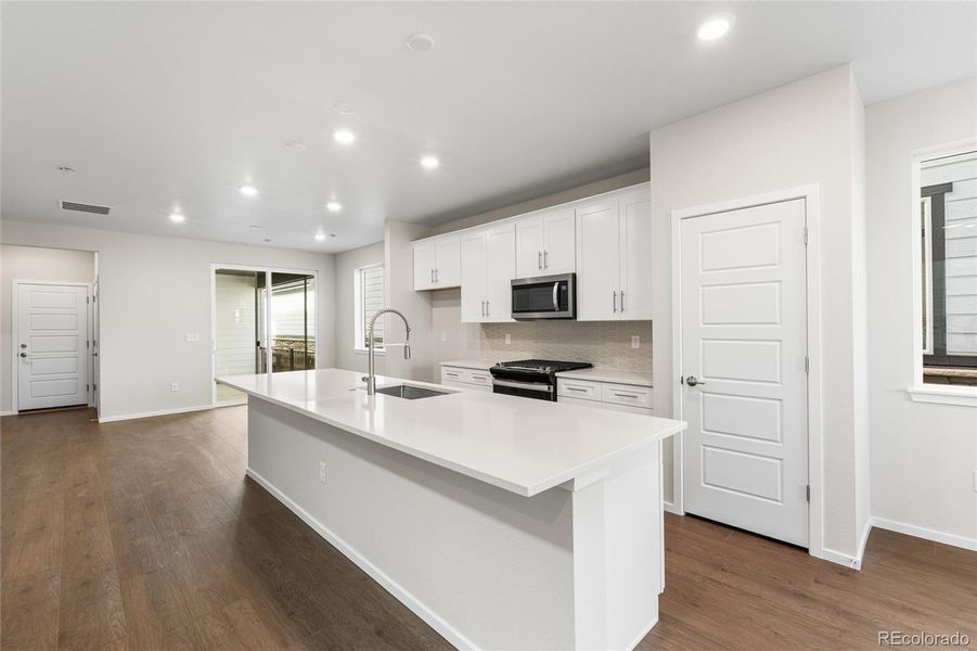 Furnished interior view inside a new home in Painted Prairie, Aurora (Image 7).