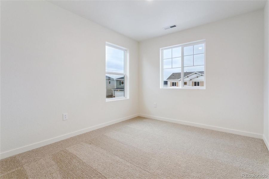Spacious, unfurnished interior of a new home in The Ridge at Lorson Ranch, Colorado Springs (Image 27).