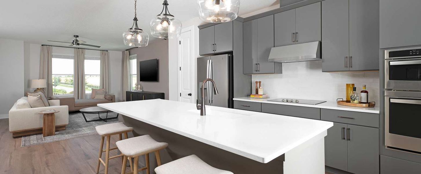 Representative furnished interior of a home built from the Haines II End Unit by Ashton Woods in Parkview at Hamlin, Winter Garden (Image 6).