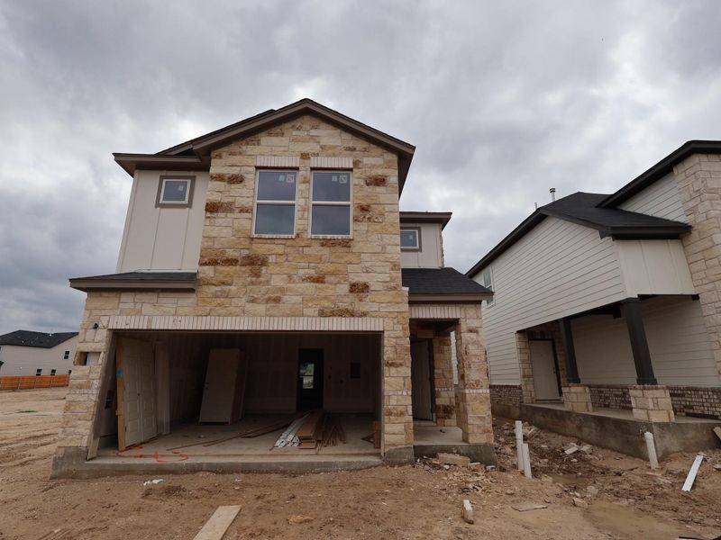 In-progress construction of a new home in Heritage, Dripping Springs, TX (Image 7). In-progress construction of a new home in Heritage, Dripping Springs, TX (Image 7).