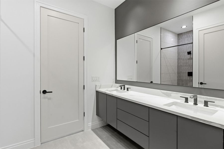 Floating vanities inside the ensuite bath.