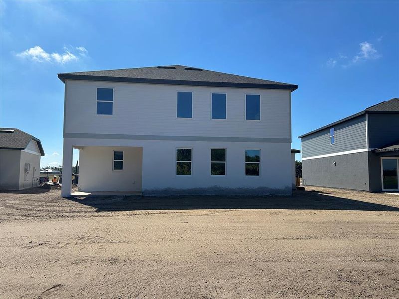 In-progress construction of a new home in Oakfield Trails Signature, Parrish, FL (Image 14).