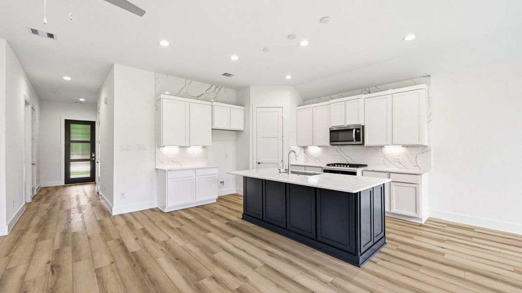 Furnished interior view inside a new home in Mill Creek Estates, Magnolia (Image 6).