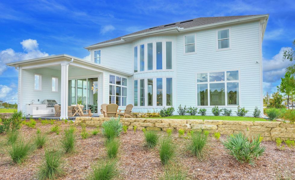 Exterior details and patio area of a home in Weslyn Park at Sunbridge, St. Cloud (Image 20).