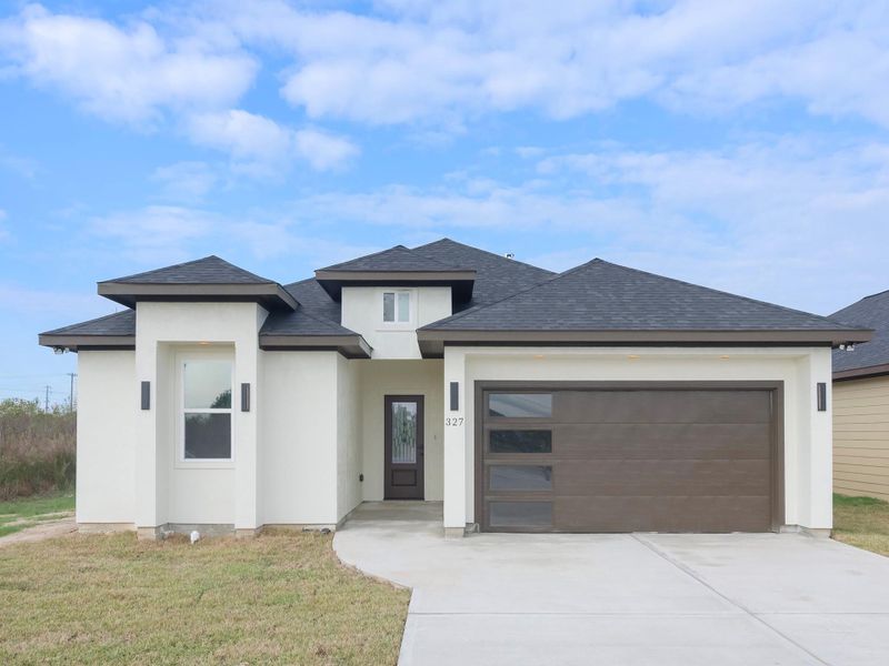 Front exterior of a new home in , Cleveland, TX, highlighting curb appeal (Image 2). Front exterior of a new home in , Cleveland, TX, highlighting curb appeal (Image 2).