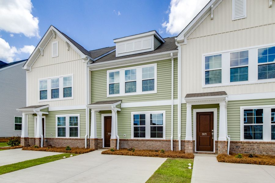 Front exterior of a new home in Astoria, Columbia, SC, highlighting curb appeal (Image 18). Front exterior of a new home in Astoria, Columbia, SC, highlighting curb appeal (Image 18).