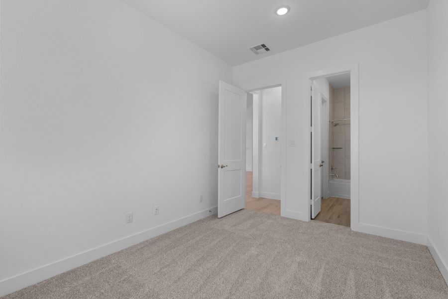 Spacious, unfurnished interior of a new home in Meridiana, Manvel (Image 31).