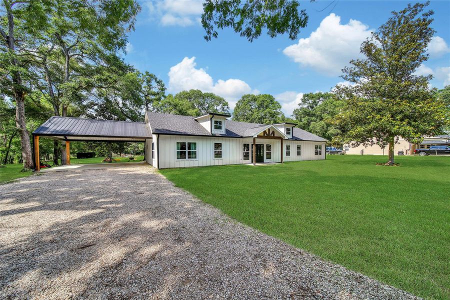 Exterior details and patio area of a home in , Splendora (Image 22).